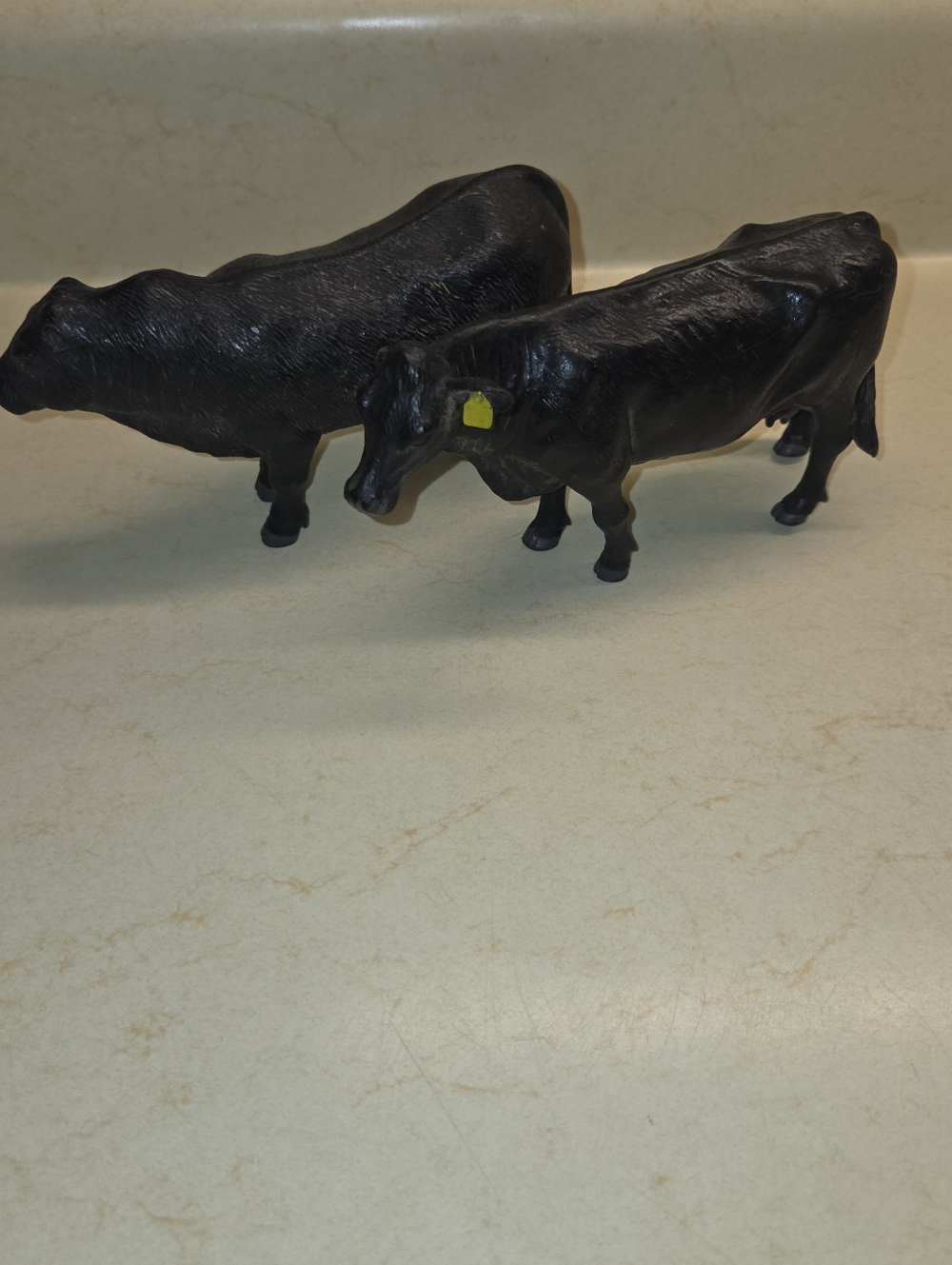 Little Buster Toys Black Angus Cow And Bull,  a 1:16 scale collector's figure